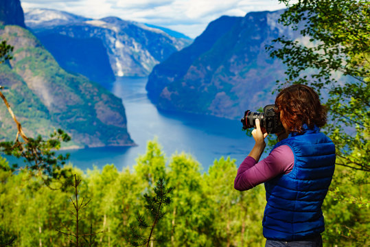 Tourist on nature take travel picture, Norway