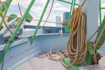 roll rope on fishing boat © sirawut