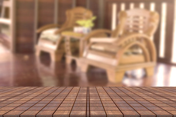 Top desk with blur living room background,wooden table