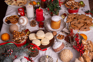 Traditional Christmas sweets cookies biscuits pastry dessert for Christmas Eve. Christmas New Year festive ornament decorations. Christmas Eve table