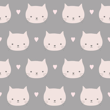 Seamless repeat pattern of sweet cat faces and hearts in pink and grey. Hand drawn vector design ideal of children and babies.