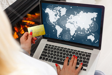 online shoping girl laptop world map