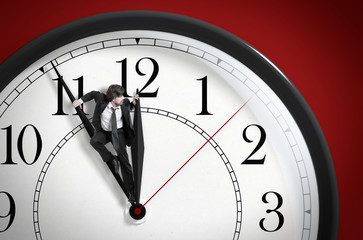 Time pressure. Deadline. Businessman trying to stop time. Time Management. Procrastinate. 