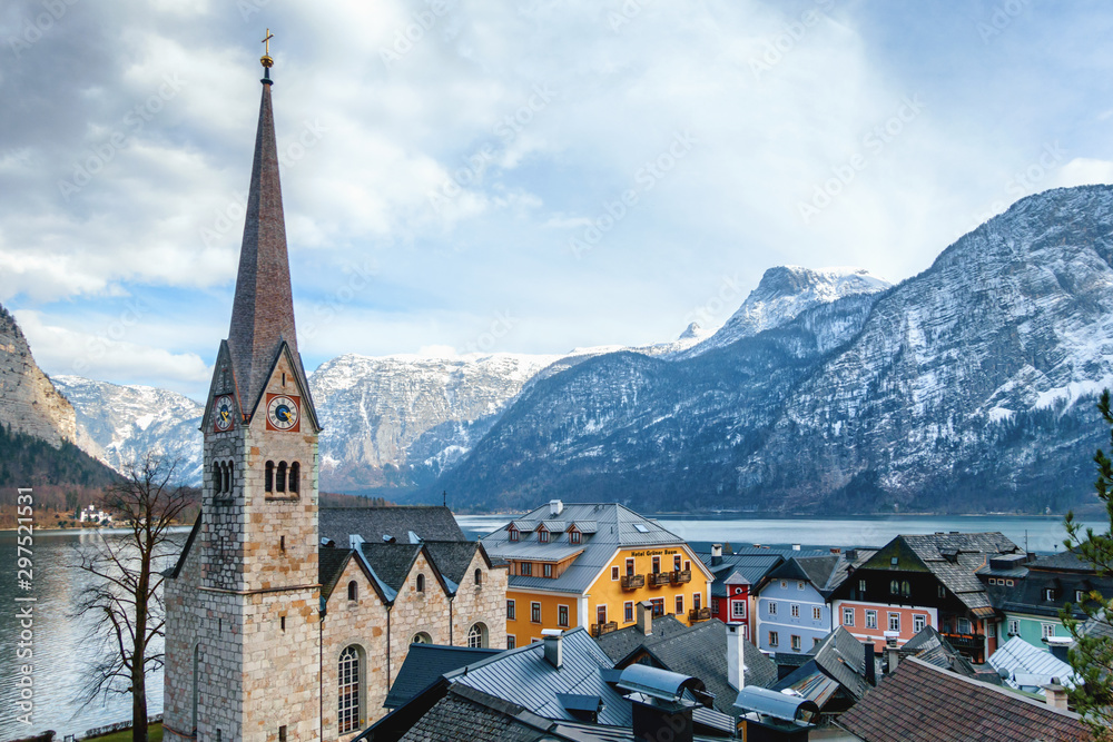 Poster HALLSTATT, AUSTRIA - MARCH 10: Classic view of Hallstatt village in Alps on March 10, 2016 in Hallstatt, Austria.It is a village in the Salzkammergut, a region in Austria.