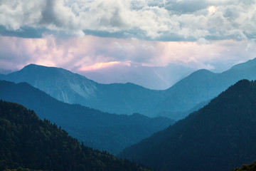 mountain landscape with sky and dark clouds