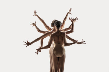 The group of modern ballet dancers. Contemporary art ballet. Young flexible athletic men and women...