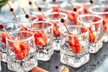 close-up canape with shrimp in glass soft background