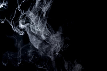 Abstract  powder or smoke isolated on black background