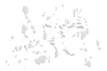 closeup drops of milk isolated on white background,abstract pattern