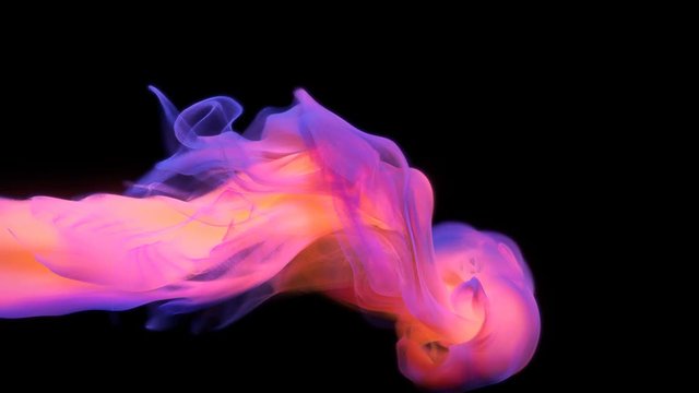 Orange purple color paint ink drops in water slow motion art background with copy space. Inky cloud swirling flowing underwater. Abstract smoke fluid  liquid animation isolated on black alpha channel