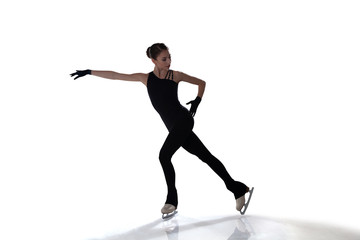 Figure skating girl isolated on white.