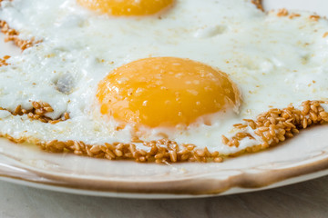 Sesame Seeds with Fried Eggs for Breakfast.