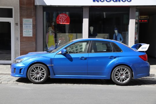 NUREMBERG, GERMANY - MAY 6, 2018: Blue Subaru Impreza WRX STI sports sedan car parked in Germany. There were 45.8 million cars registered in Germany (as of 2017).