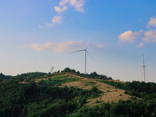 wind turbines in the field with beautiful landscape  