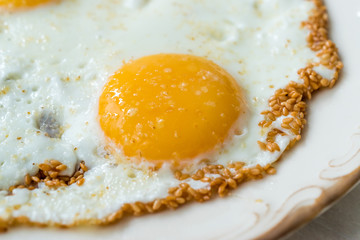 Sesame Seeds with Fried Eggs for Breakfast.