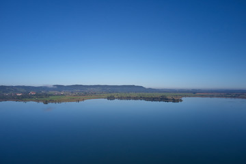 Beautiful panorama of lake Kochelsee, Bavaria Germany. Flying on drone.
