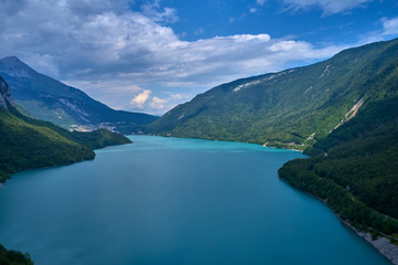 Fototapeta na wymiar Panoramic view of the lake Molveno north of Italy. Trento region. Great trip to the lake in the Alps. Aerial photography