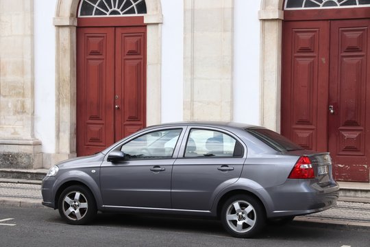 COIMBRA, PORTUGAL - MAY 26, 2018: Chevrolet Aveo economy compact sedan car in Portugal. There are more than 5.1 million motor vehicles registered in Portugal.