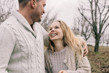 Fototapeta premium couple in love walks and cuddles in nature