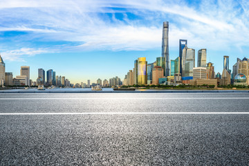 Fototapeta na wymiar City skyline and asphalt road in Shanghai