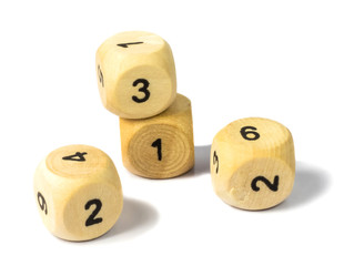 Wooden cubes with figures on white background