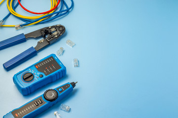 Network tester, patching cord, modular plug and network tool