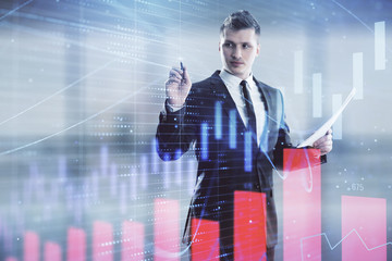 Businessman and forex graph hologram. Double exposure. Concept of financial education and analysis