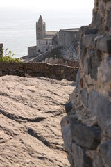 Bell tower and church of San Pietro in Portovenere photographed from the street leading to the castle.
