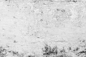 Texture of a concrete wall with cracks and scratches which can be used as a background