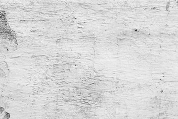 Texture of a concrete wall with cracks and scratches which can be used as a background
