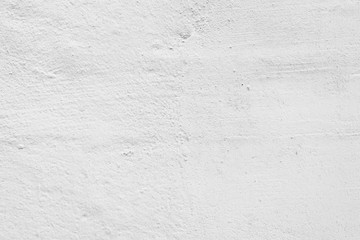 Texture of a concrete wall with cracks and scratches which can be used as a background