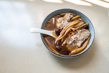 A bowl of nutritious yellow day red dates pork bone soup