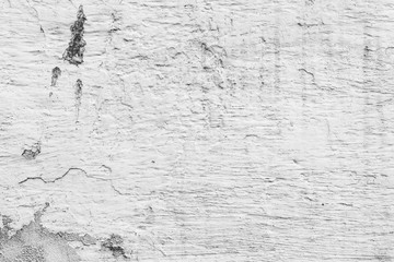 Fototapeta premium Texture of a concrete wall with cracks and scratches which can be used as a background