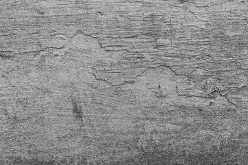 Texture of a concrete wall with cracks and scratches which can be used as a background