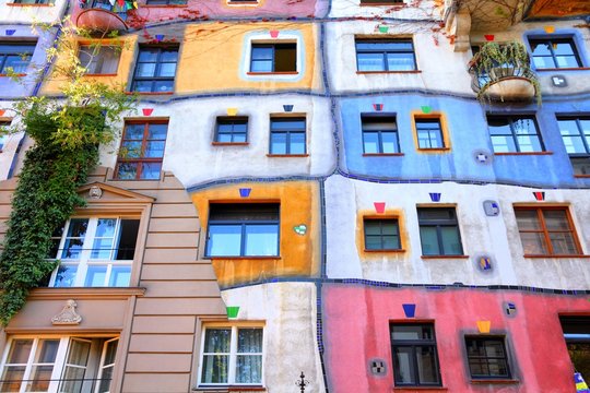 VIENNA, AUSTRIA - SEPTEMBER 6, 2011: Hundertwasser Haus in Vienna. The iconic building was finished in 1985 and is one of finest examples of expressionist architecture.