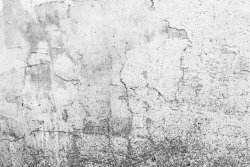 Texture of a concrete wall with cracks and scratches which can be used as a background