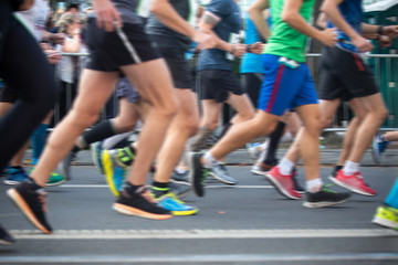 Marathon runners, running on the city road.