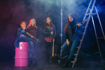 Rebel youth. Full length portrait of cocky children in stylish jeans and leather clothes. Concept...