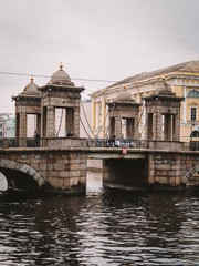 Autumn gloomy streets of the city, the facades of beautiful old buildings in St. Petersburg