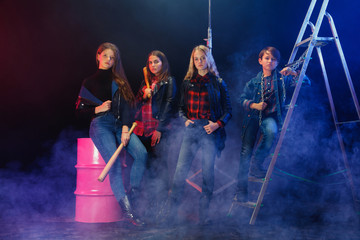 Rebel youth. Full length portrait of cocky children in stylish jeans and leather clothes. Concept...