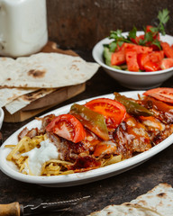 beafsteak mixed with ketchup and fresh tomato in the dish 1