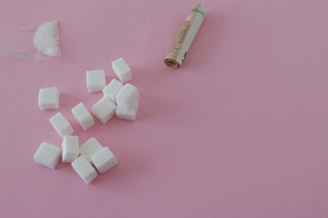 white sugar is like drugs, scene recreating drugs.Black background