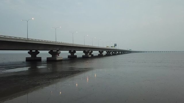 Fly toward Penang second bridge ( Sultan Abdul Halim Muadzam Shah Bridge) in late evening.