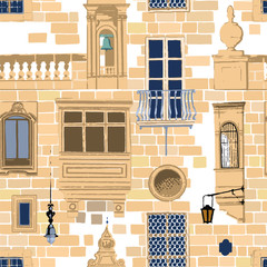 Fototapety  Maltańskie balkony i okna z różnymi dekoracjami i kolorami na kamiennych ceglanych ścianach