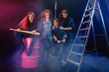 Rebel youth. Full length portrait of cocky children in stylish jeans and leather clothes. Concept...