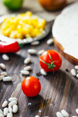 Red ripe Cherry tomatoes on a wooden table