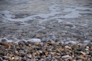 Sea horizon and pebble beach scenery