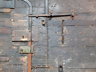 door ancient black wooden medieval door with iron locks and bolts on chester cathedral