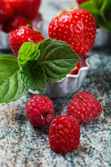 Strawberries and raspberries with mint