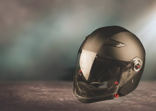 Black biker helmet isolated on white background